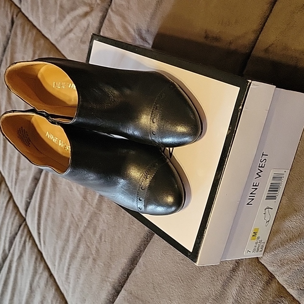 Black leather below ankle heels